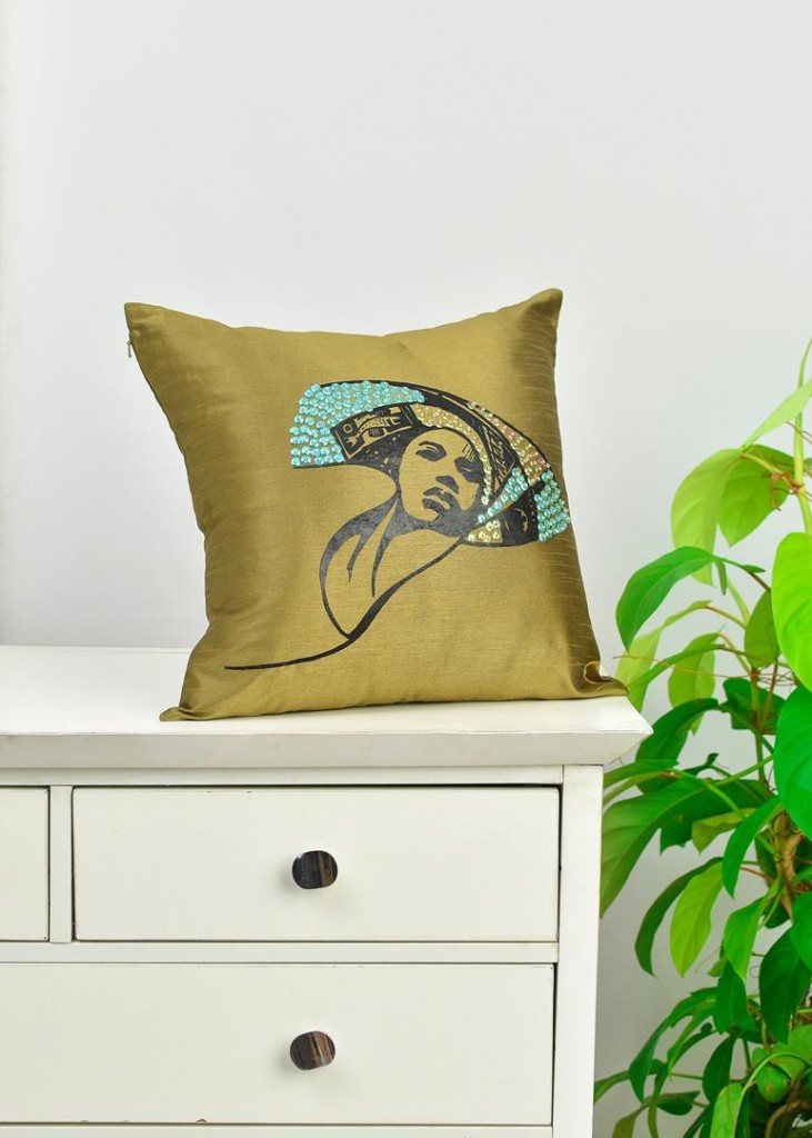 Tayo Shonekan of Aimas makes beaded throwpillows that features the African woman in all her glory