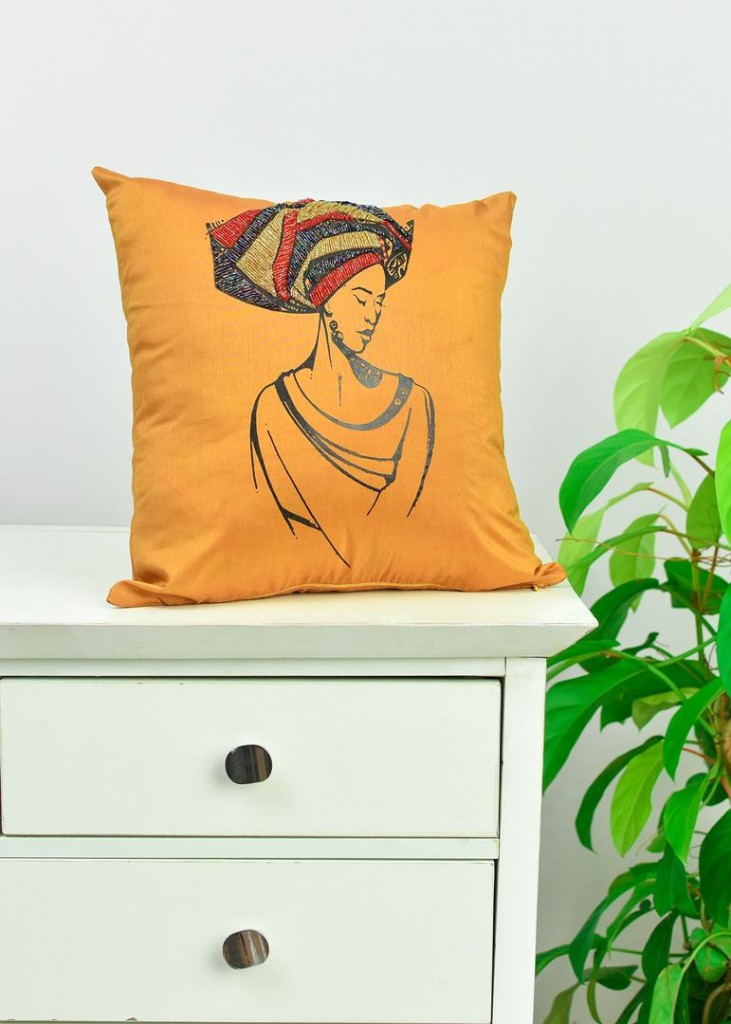 Tayo Shonekan of Aimas makes beaded throwpillows that features the African woman in all her glory