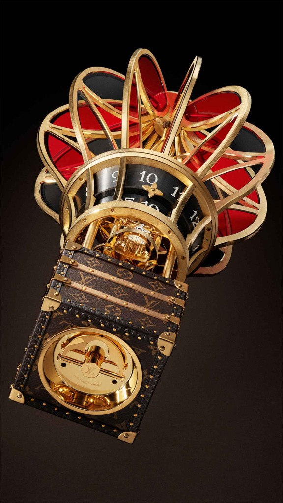 Attached to the base is the clock's mechanical movement by l'epee